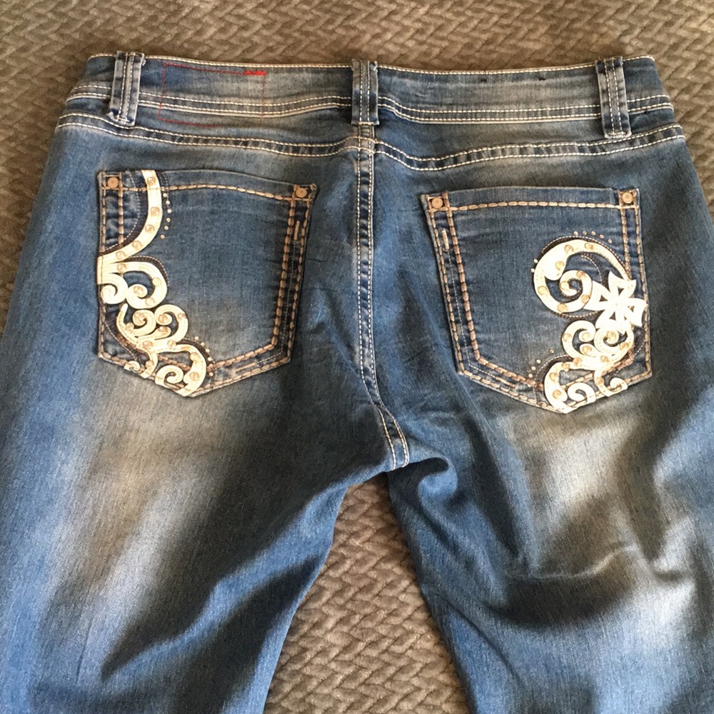 Like new Rose Royce jeans size 29x32.